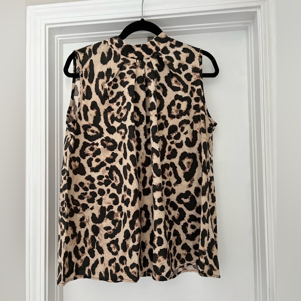 Women’s sleeveless animal print blouse